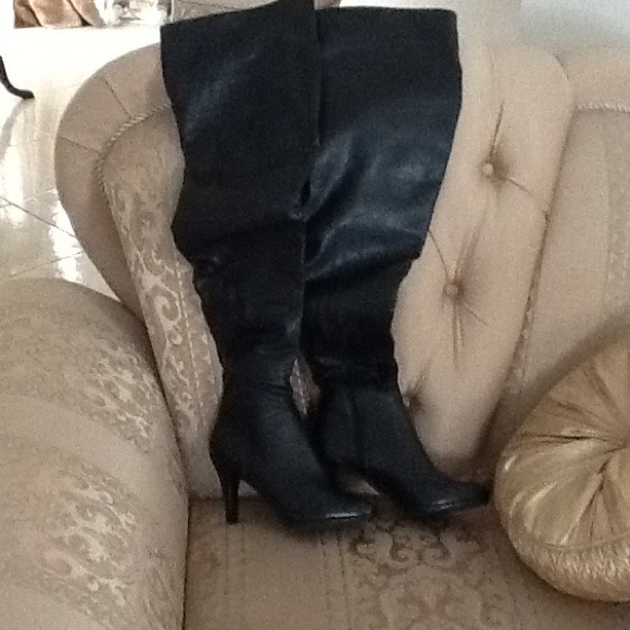 Black thigh high boot