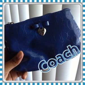 Liquid gloss Medium Wristlet COACH