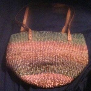 Woven pattern handbag.