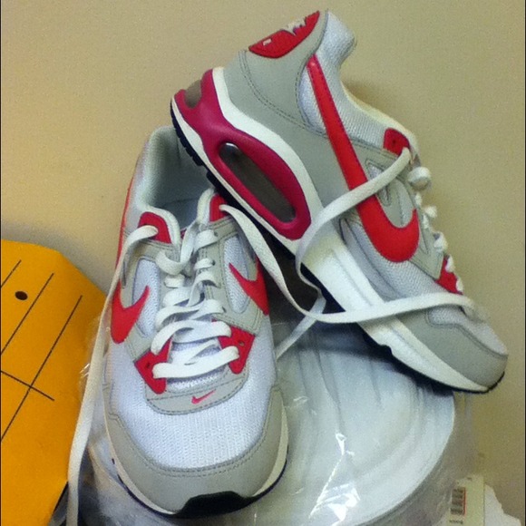 Pink and white Nikes