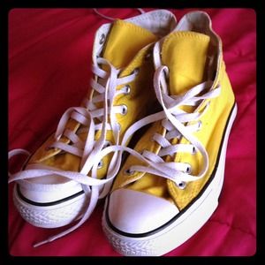Yellow high top converse chucks