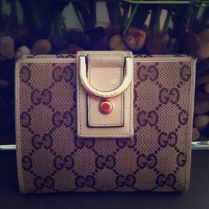 Authentic Gucci bi-fold wallet
