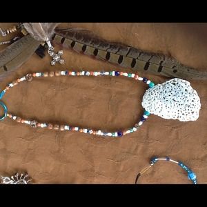 multi / color beads ,plus shell pendant