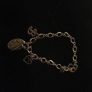 James Avery charm bracelet with 4 charms