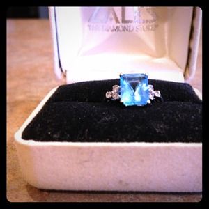 Jaw dropping 2 carat Blue Topaz Emerald cut ring!