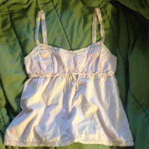 Light pink tank top. Crochet detail and beading.