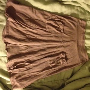Light brown skirt. Front pockets.