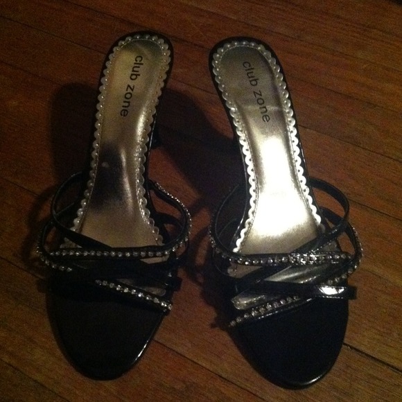 Black strapped sandals.