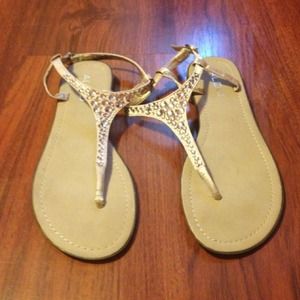 Used once. Aldo sandals with gold rhinestones.