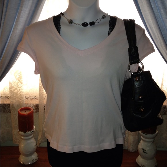 Chico's size 2 light pink t-shirt.