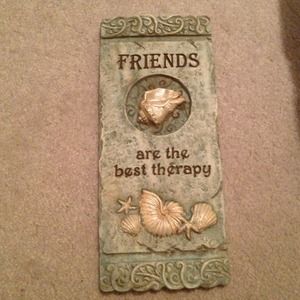 Stone sign " friends Are the best therapy "