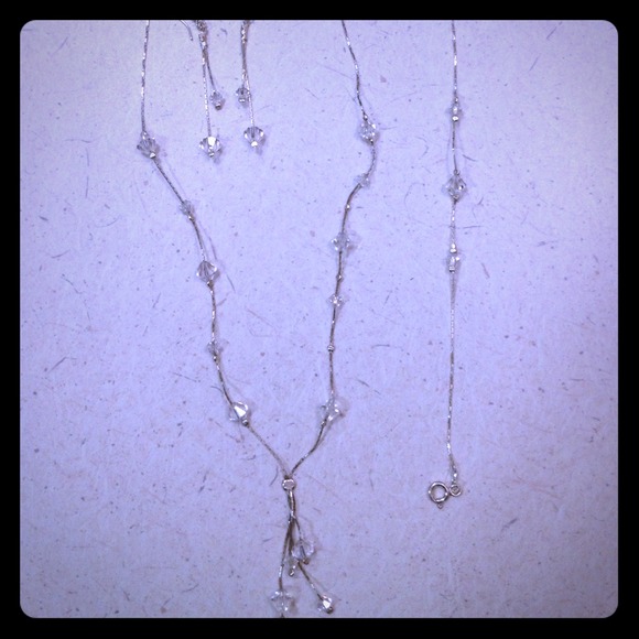 Necklace, ear rings, and bracelet
