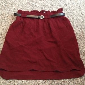 Maroon skirt.