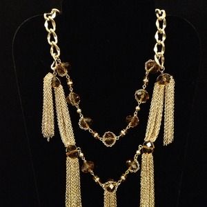 Tassel neck piece