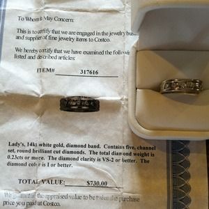 Ladies size 8 white gold diamond band.