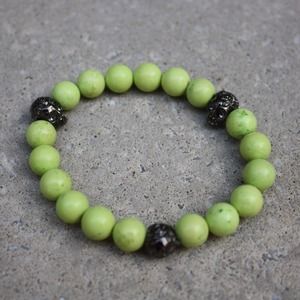 Neon yellow/skulls bracelet. Brand new