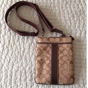 Brown Coach cross-body purse