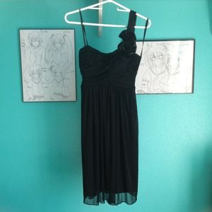 One strapped black dress