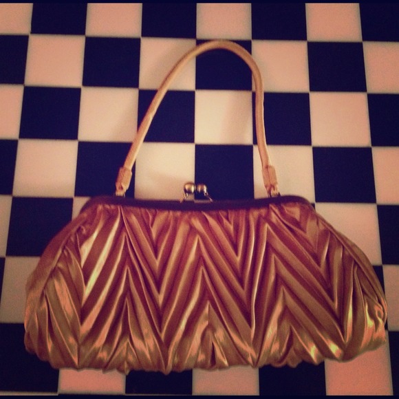 Tan evening bag.