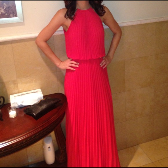 Red pleated gown w/ gold neckline