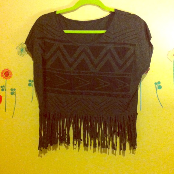 Cropped tribal print with fringes. Never worn!