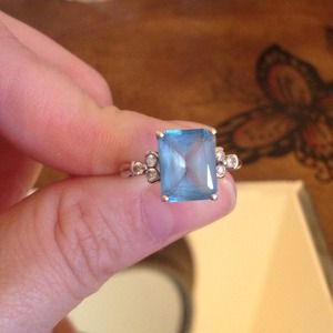 Blue topaz ring in 10k white gold