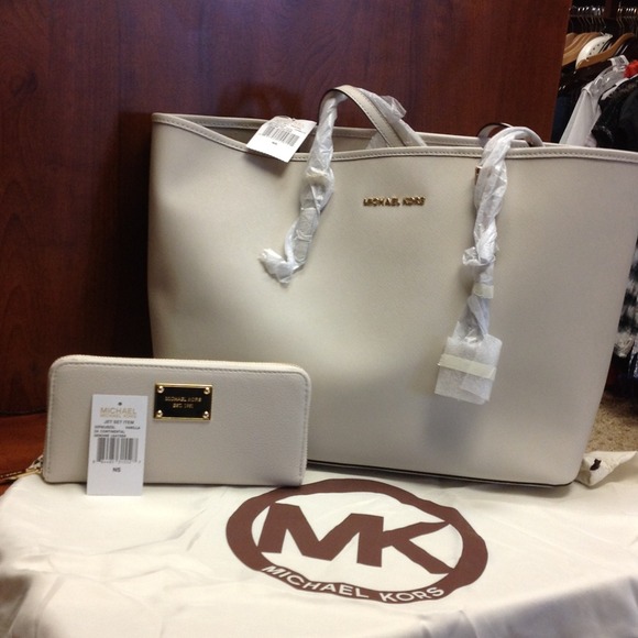 Authentic Michael Kors tote and matching wallet