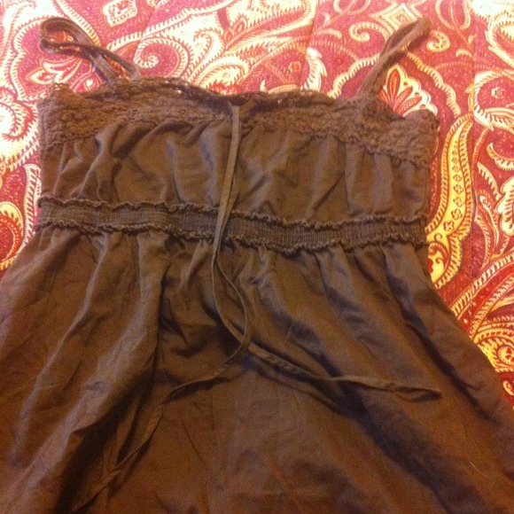 Never worn tank ruffly brown top.