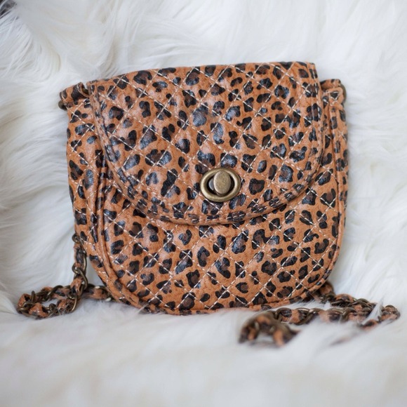 Animal Print Purse + White Fur Coat + Black Fur