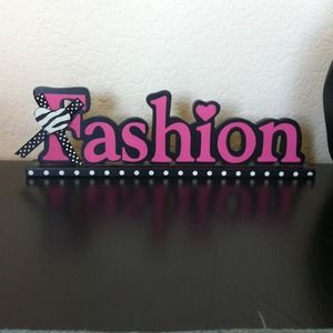 Hot pink fashion sign with black outline
