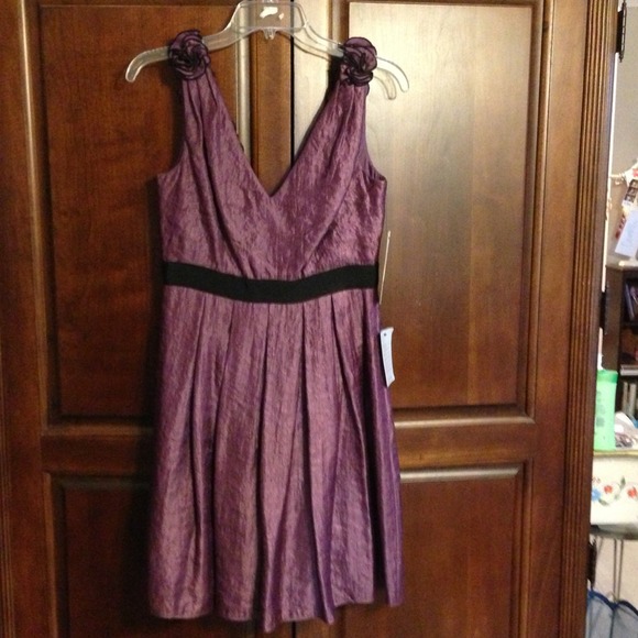 Stunning purple rosette cocktail dress