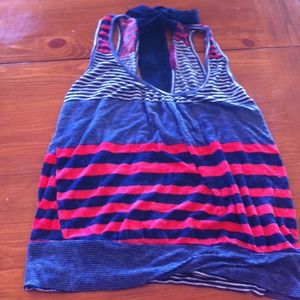 Red white and blue tee shirt with tie in the back