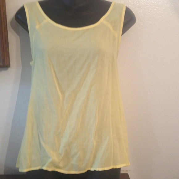 Yellow tank top with open back cris cross