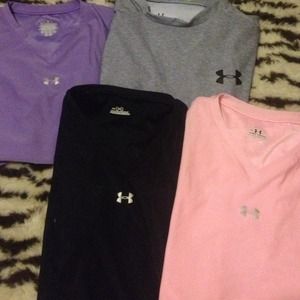 Lot of 4 under armour shirts S-M
