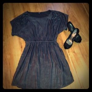 Express Dress with sequin design in sleeve!