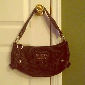 Black leather Guess purse.