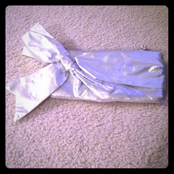 Silver Steve Madden clutch.