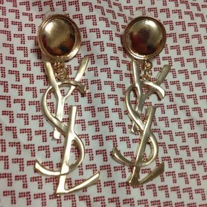 Statement earrings. YSL