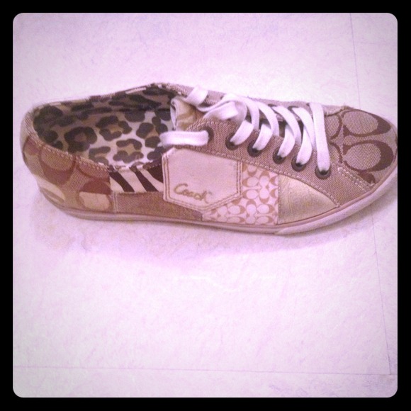 Brown logo Coach sneakers with leopard inside