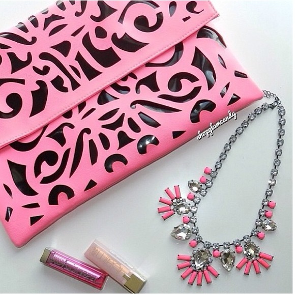 Clutches & Wallets - Neon pink laser cut clutch