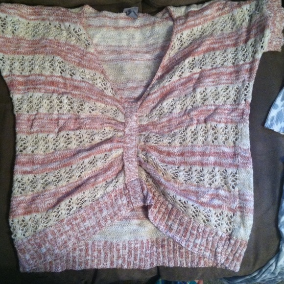 Crocheted cropped sweater.