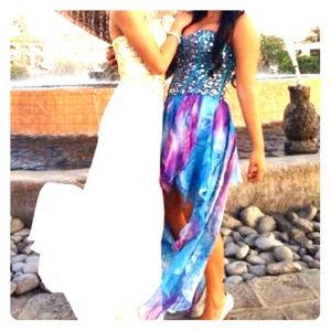 Prom girl sequin high low turquoise/purple dress.