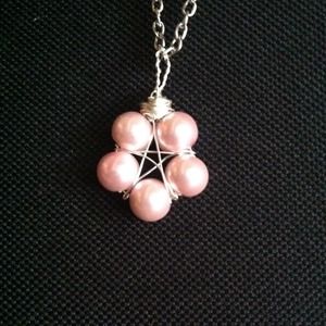 Light pink pearl, wire wrapped star necklace!