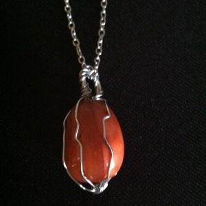 Wire wrapped orange jemstone