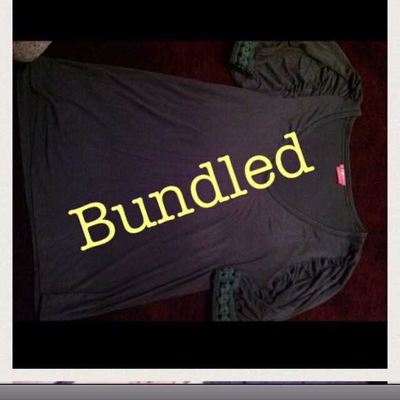 Gray top with fabric lattice work on sleeves