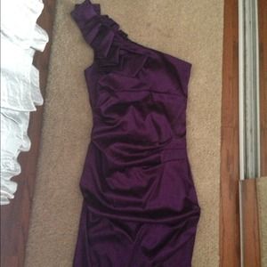 Purple knee length homecoming dress