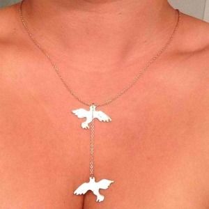 LOOKING FOR: Brandy Melville bird necklace in gold