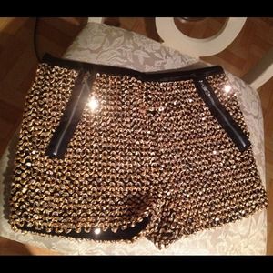 Gold shorts w/ zippers on the sides!