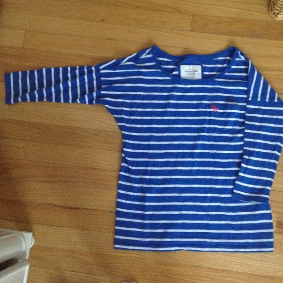 Blue half sleeved t shirt with thin white stripes