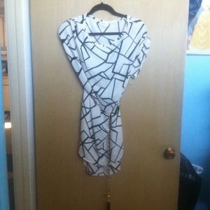 Black and white dress with gold chain belt
